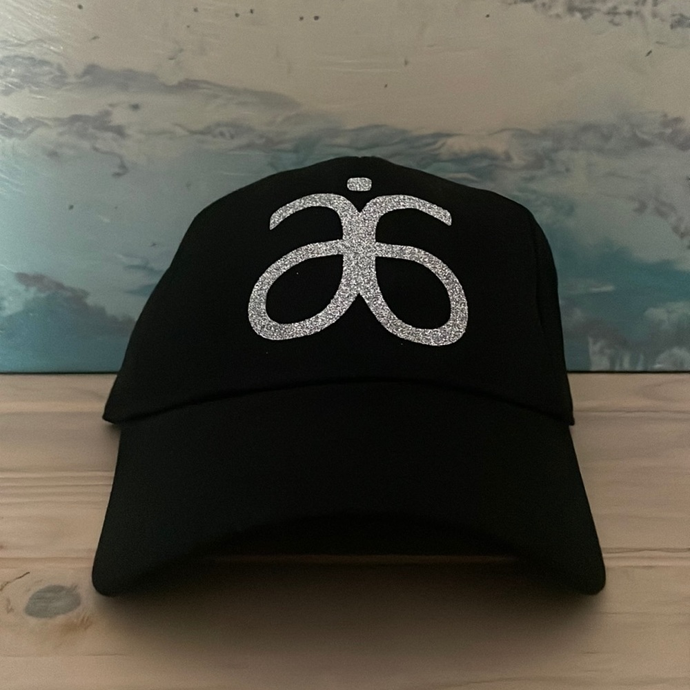 ARBONNE logo’d hat black and silver adjustable Velcro back NWT